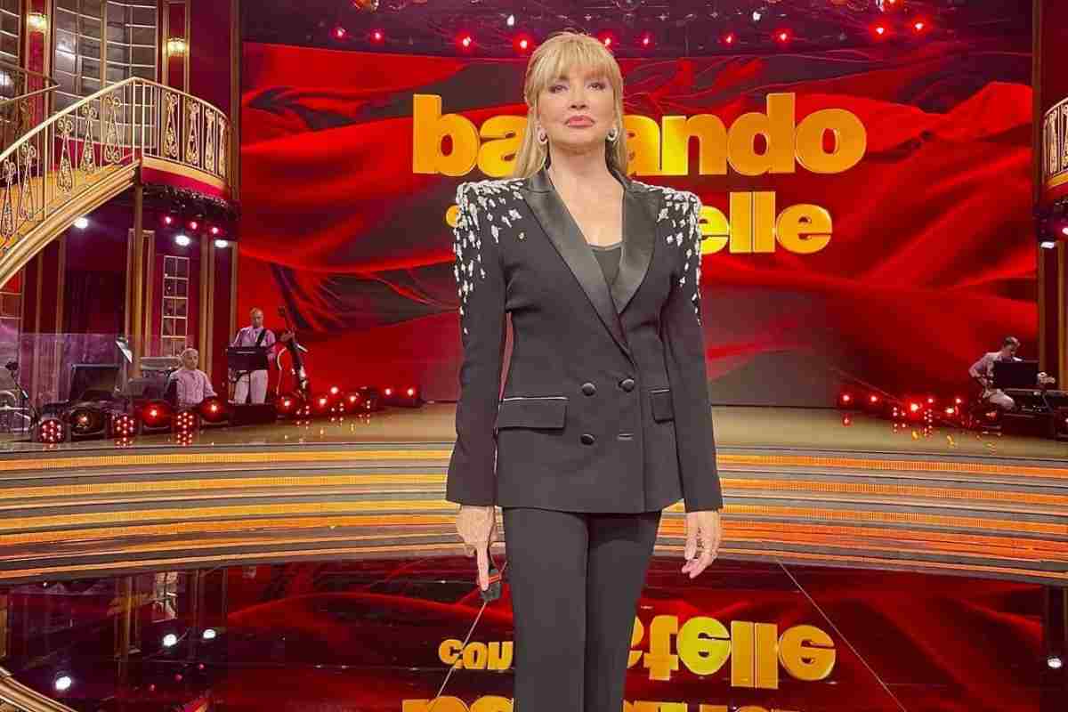 Ballando con le stelle reazione Milly Carlucci ritiro Banfi